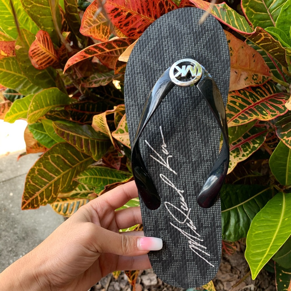 Authentic Michael Kors canvas flip flops